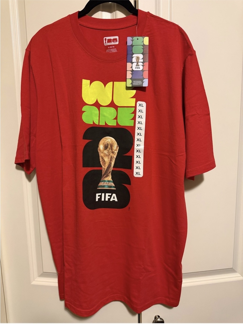 NWT 2026 FIFA WORLD CUP SOCCER TSHIRT IN RED/ WORLD CUP LOGO On FRONT.SIZE XL